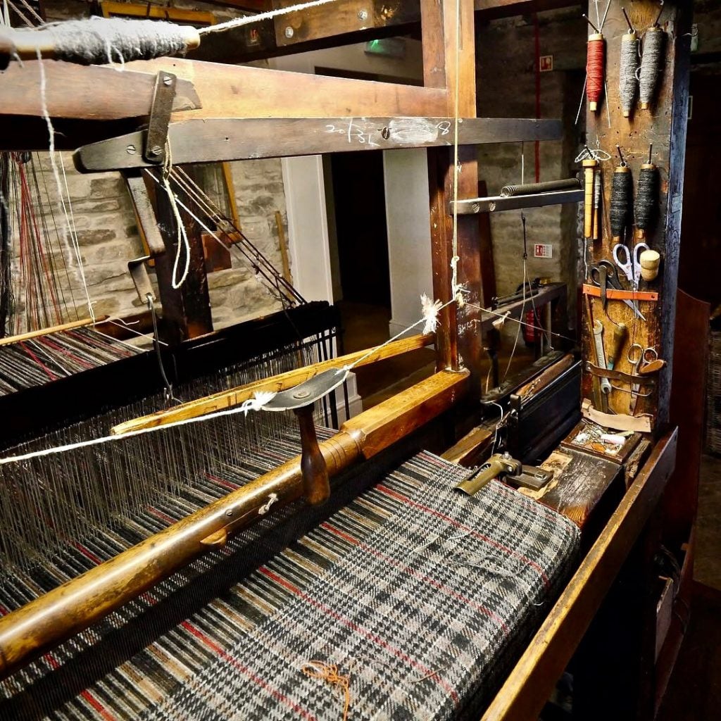 Fabric being woven at the Colne Valley Museum