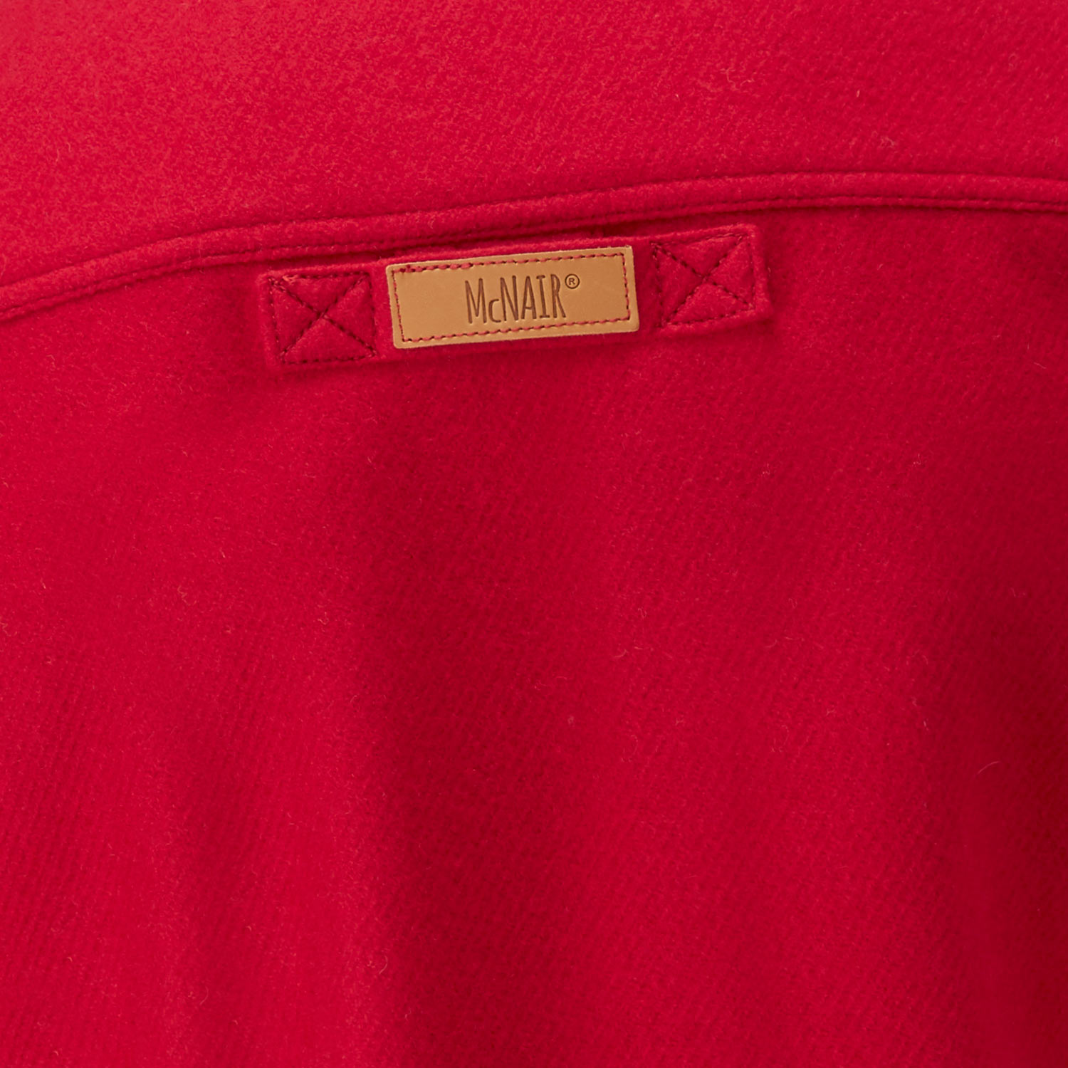 McNair Chilli Red merino Gilet - back label